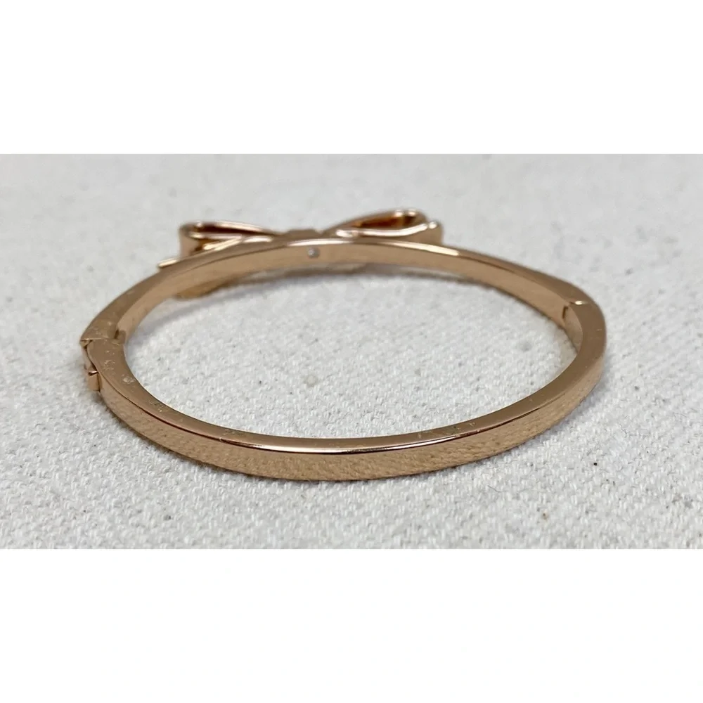 KATE SPADE • Rose Gold Bow Love Notes Bangle Bracelet - Picture 4 of 9